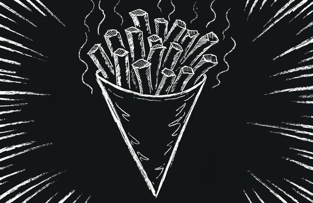 Umgekippte Pommes-Tüte mit fliegenden Frites — A-Pommesbude